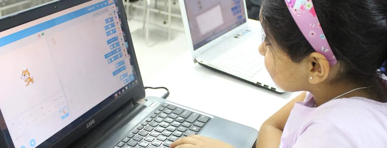 Student in a CodingChamp Scratch class